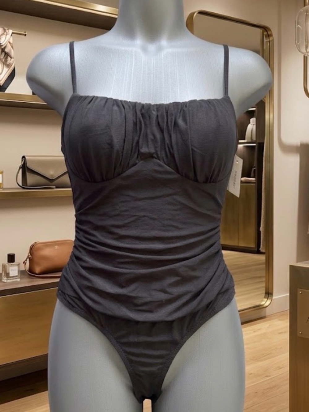 Sleek Black Ruched One-Piece Bodysuit